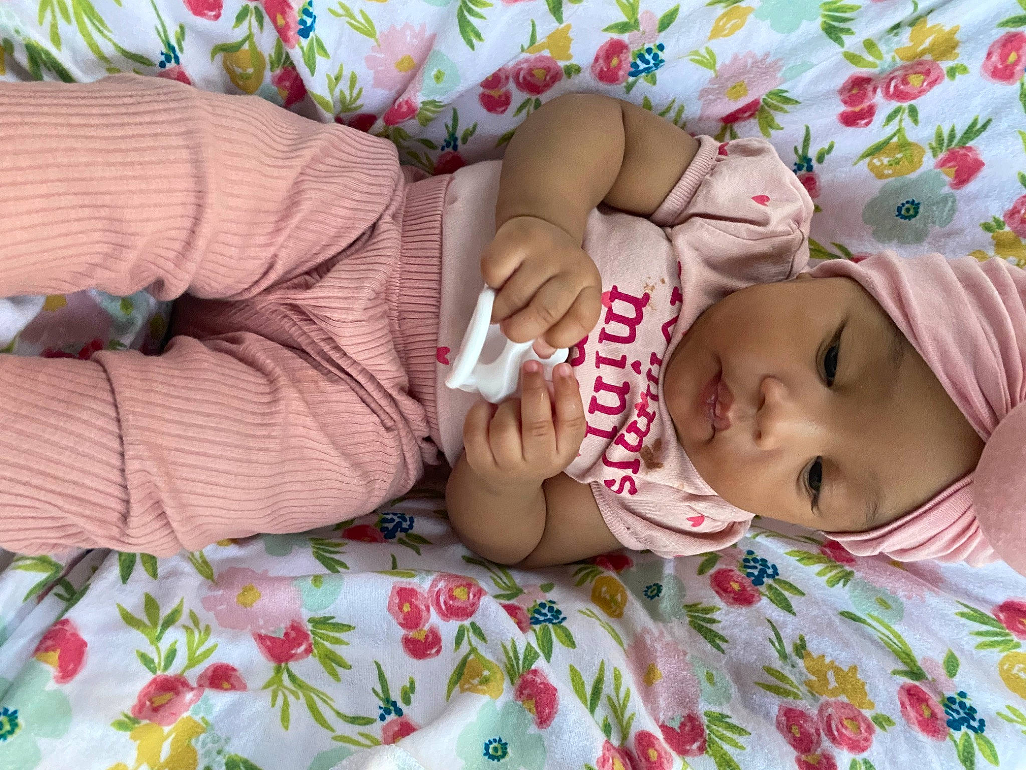 Mya is registered to the contest to win money with this photo: baby, baby_products, baby_sleeping, baby_toddler_clothing, cheek, child, comfort, dress, eye, eyelash, fashion_accessory, head, headwear, human_body, linens, nail, pattern, person, room, skin