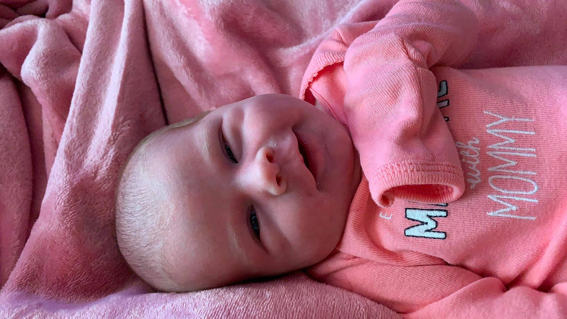 Gwendolyn is registered to the contest to win money with this photo: baby, baby_sleeping, bedtime, cheek, child, close_up, face, finger, hand, lip, mouth, nose, person, pink, skin, sleep, toddler