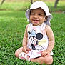 baby, cap, clothing, dress, face, grass, hat, head, lawn, nature, outdoors, park, person, photography, plant, portrait, sitting, summer, sunhat, vegetation