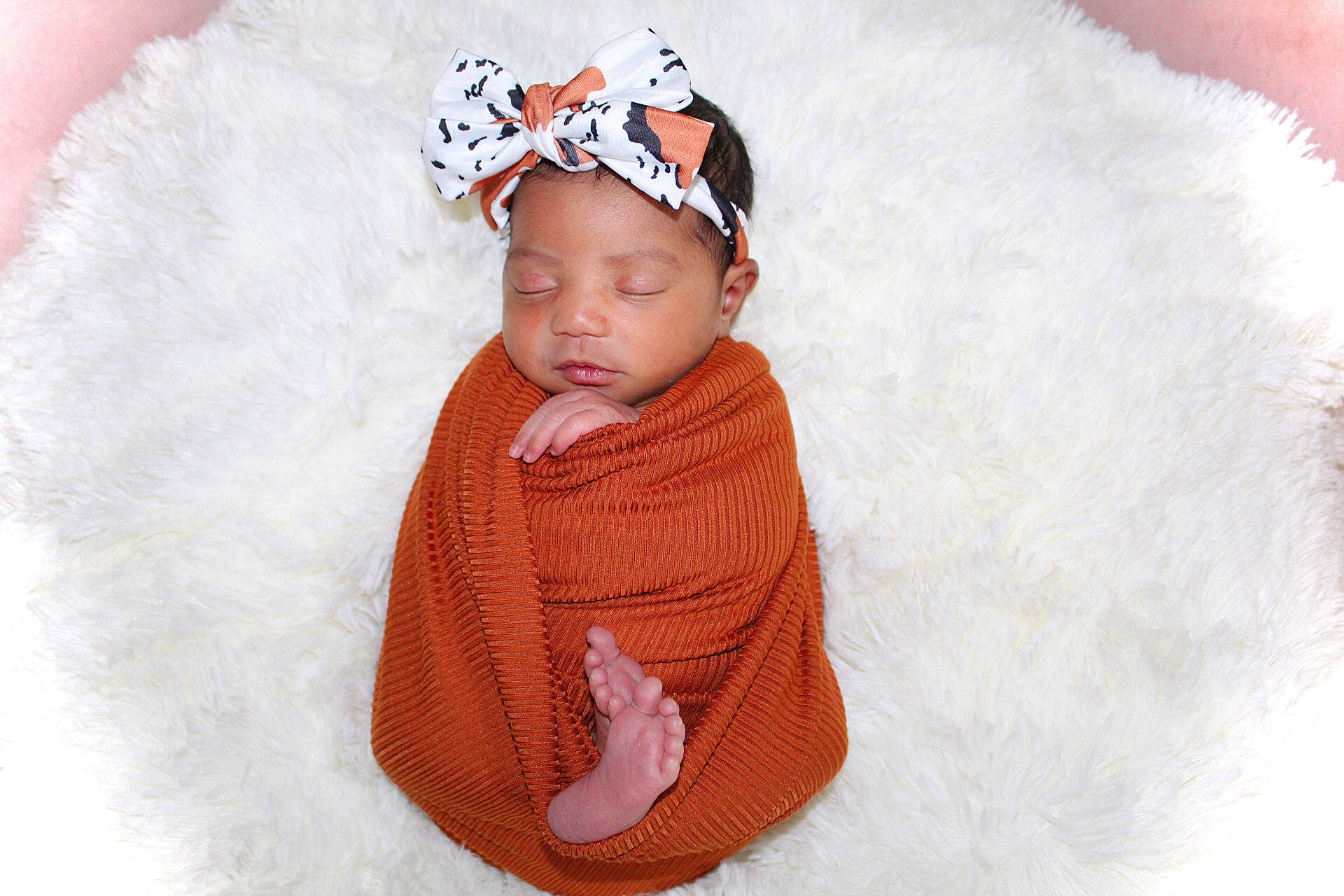 Lilah is registered to the contest to win money with this photo: baby, baby_toddler_clothing, beanie, cap, cheek, child, embellishment, facial_expression, fashion_accessory, headband, headgear, headpiece, headwear, knit_cap, linens, magenta, pattern, person, skin, sleeve