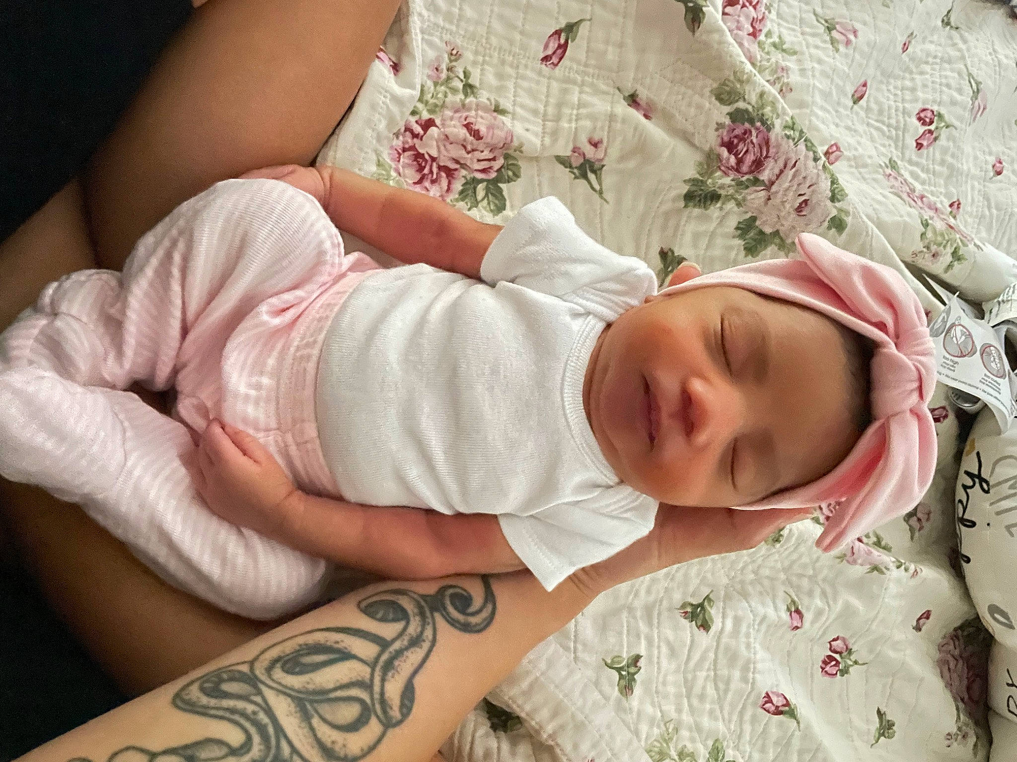 Lilah is registered to the contest to win money with this photo: baby, baby_products, baby_sleeping, baby_toddler_clothing, cheek, child, comfort, elbow, eye, finger, head, headwear, human_leg, linens, nail, pattern, person, skin, sleeve, thigh