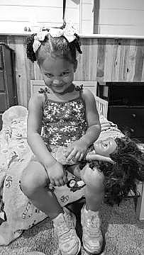 K'Eondra is registered to the contest to win money with this photo: baby_toddler_clothing, black, black_and_white, child, fun, happy, headband, human, monochrome, monochrome_photography, pattern, person, photograph, portrait_photography, room, sitting, smile, snapshot, style, toddler