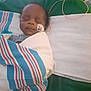 Josiah joined the competition — help win amazing prizes! baby, infant, sleeping, hospital, blanket, medical_tube, bed, child, patient, face, person, resting, healthcare, newborn, cozy, wrapped, cute, peaceful, indoors, soft