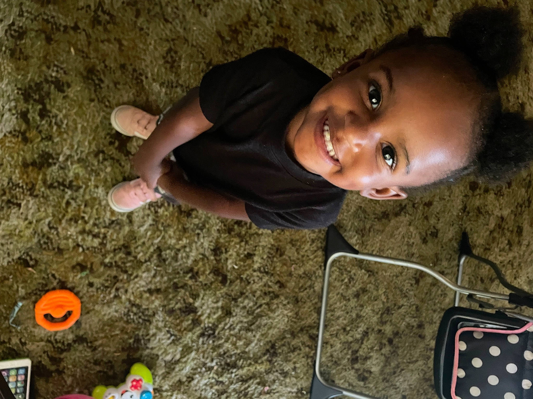 Janiya is registered to the contest to win money with this photo: adaptation, child, cool, flash_photography, fun, grass, happy, joy, leisure, nose, people_in_nature, person, photograph, play, recreation, sitting, smile, snapshot, soil, t_shirt