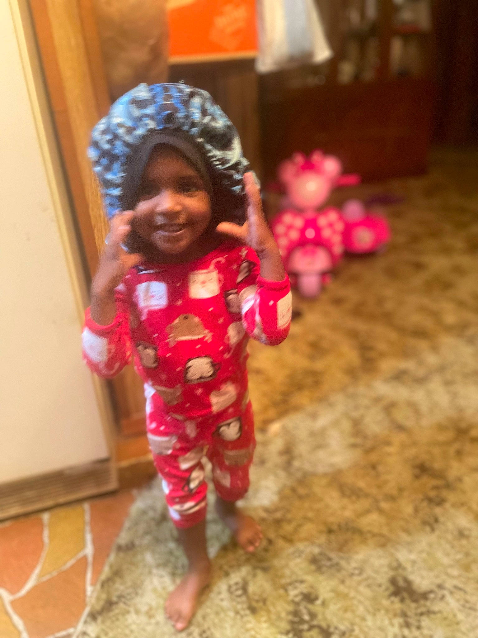 Janiya is registered to the contest to win money with this photo: child, event, facial_expression, fashion_design, flooring, fun, hairstyle, happy, headwear, human_leg, joy, leg, magenta, person, pink, play, skin, sleeve, smile, textile