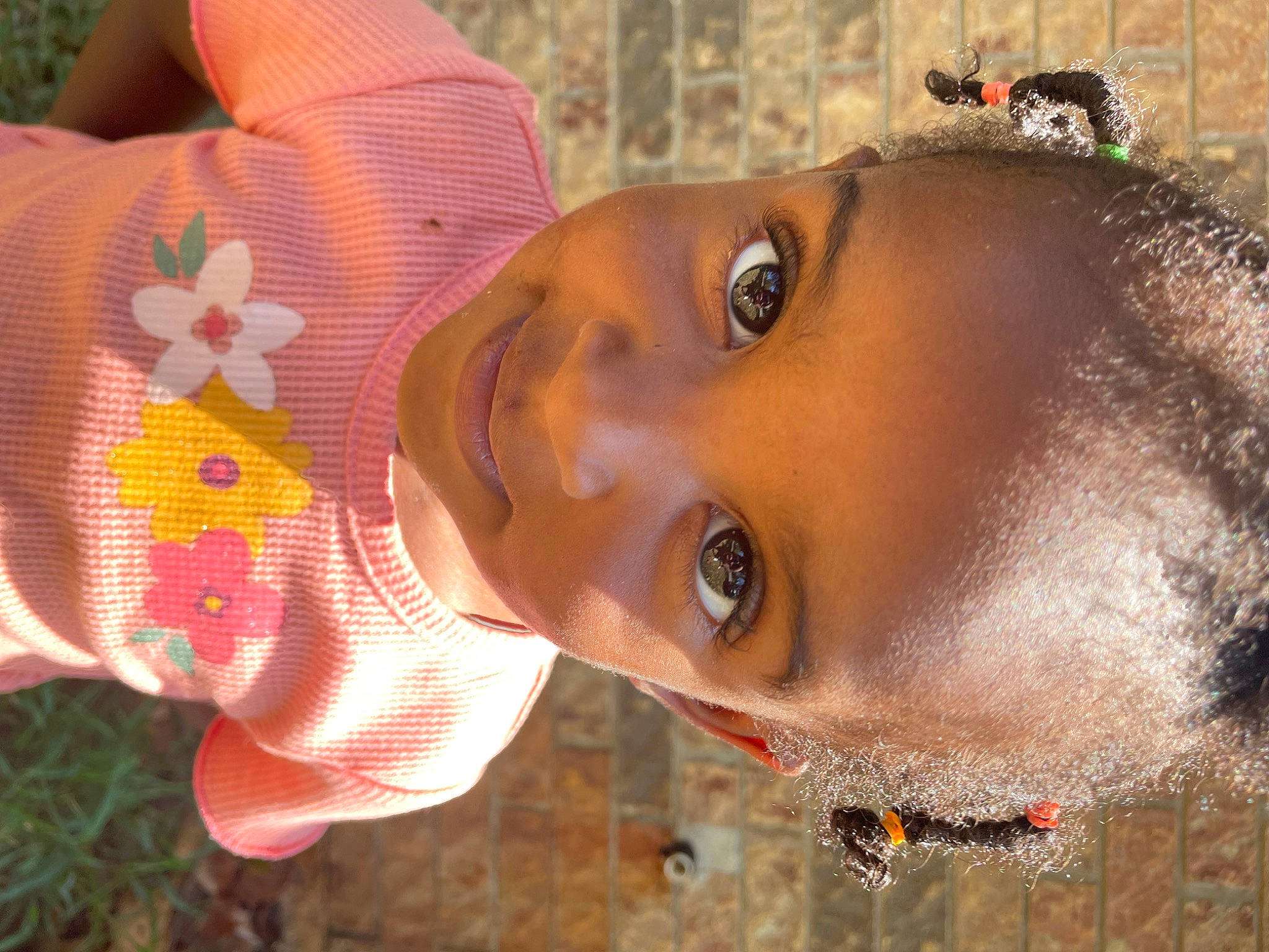 Janiya is registered to the contest to win money with this photo: black_hair, child, cool, eyelash, eyewear, fun, grass, happy, hat, headgear, lip, mouth, neck, nose, people_in_nature, person, plant, skin, summer, tree