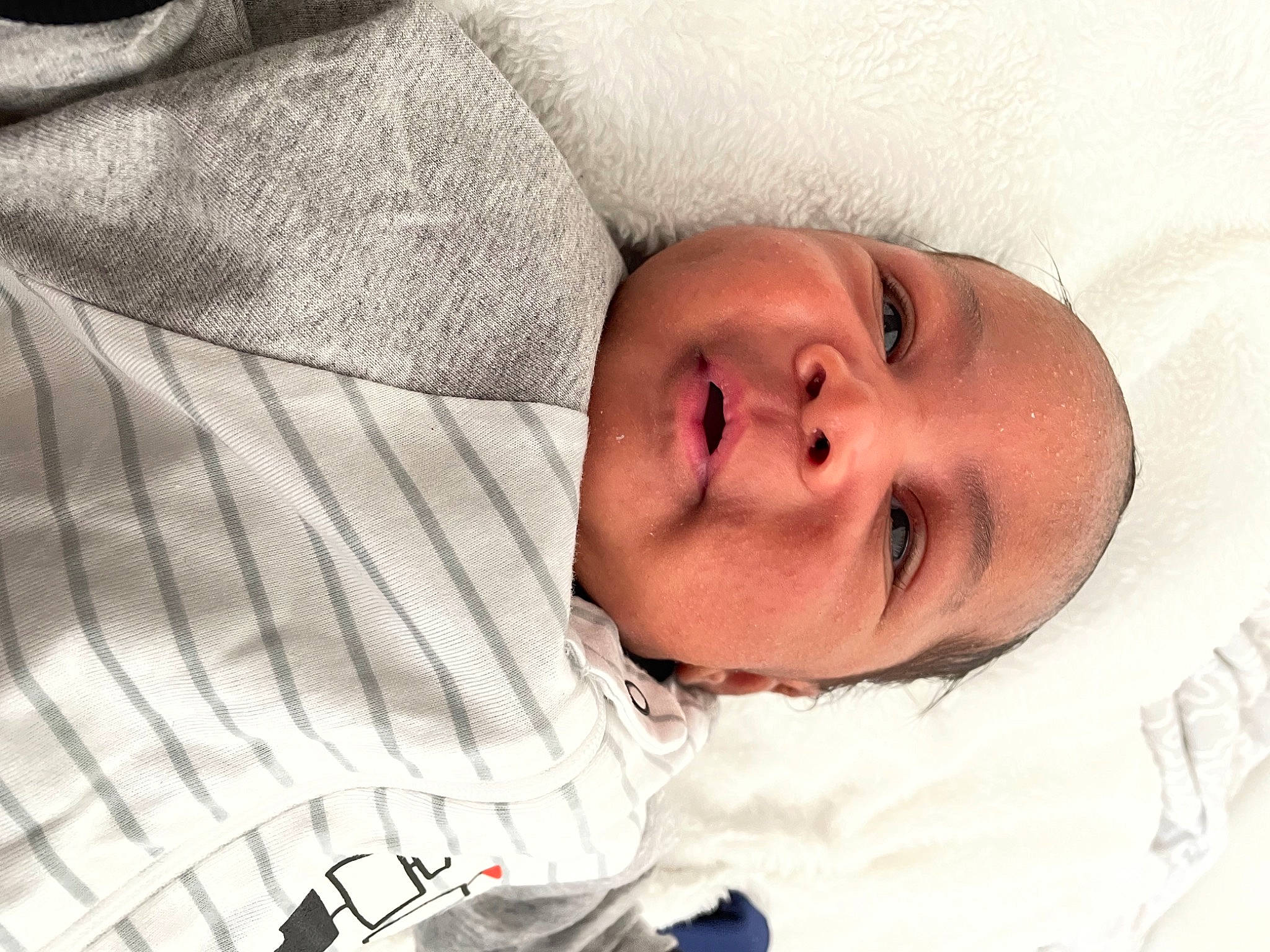 Amani joined the competition — help win amazing prizes! baby, baby_products, baby_sleeping, baby_toddler_clothing, bedtime, cheek, child, comfort, eyebrow, eyelash, iris, linens, lip, mouth, nose, people, person, skin, sleeve, textile