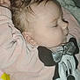 baby, infant, sleeping, pink_clothing, minnie_mouse, cartoon, blanket, sherpa, closeup, face, cheek, ear, hair, eyelashes, cozy, indoor, flash, soft_texture, pajamas, cute