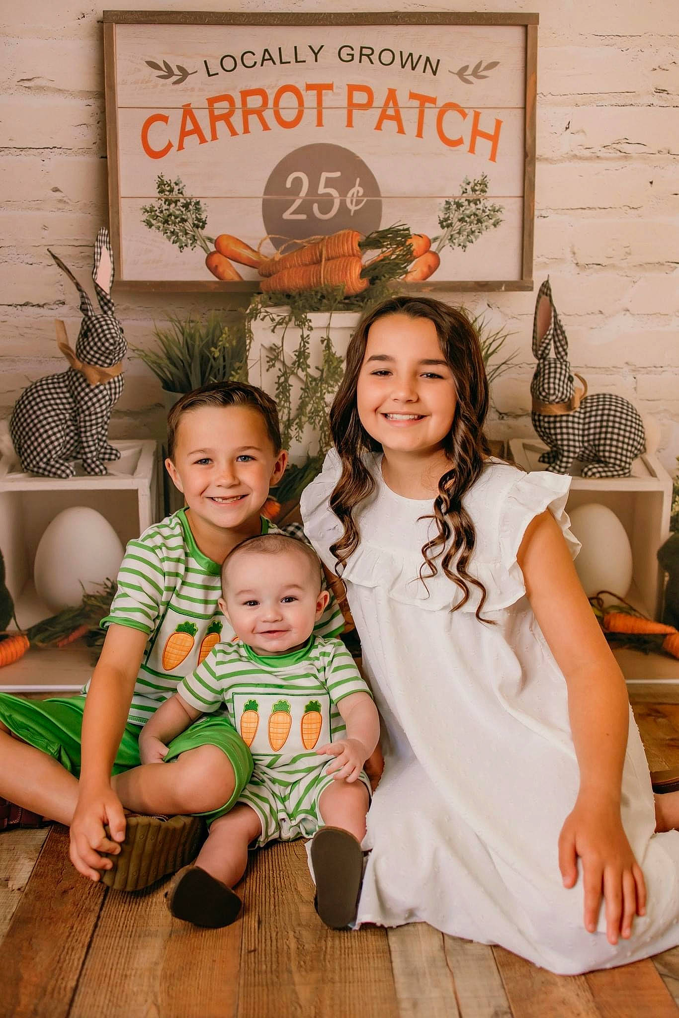 Karter Wayne is registered to the contest to win money with this photo: baby, baby_toddler_clothing, child, event, eye, facial_expression, flooring, fun, hairstyle, happy, human, joy, pattern, person, picture_frame, shorts, sitting, smile, social_group, t_shirt