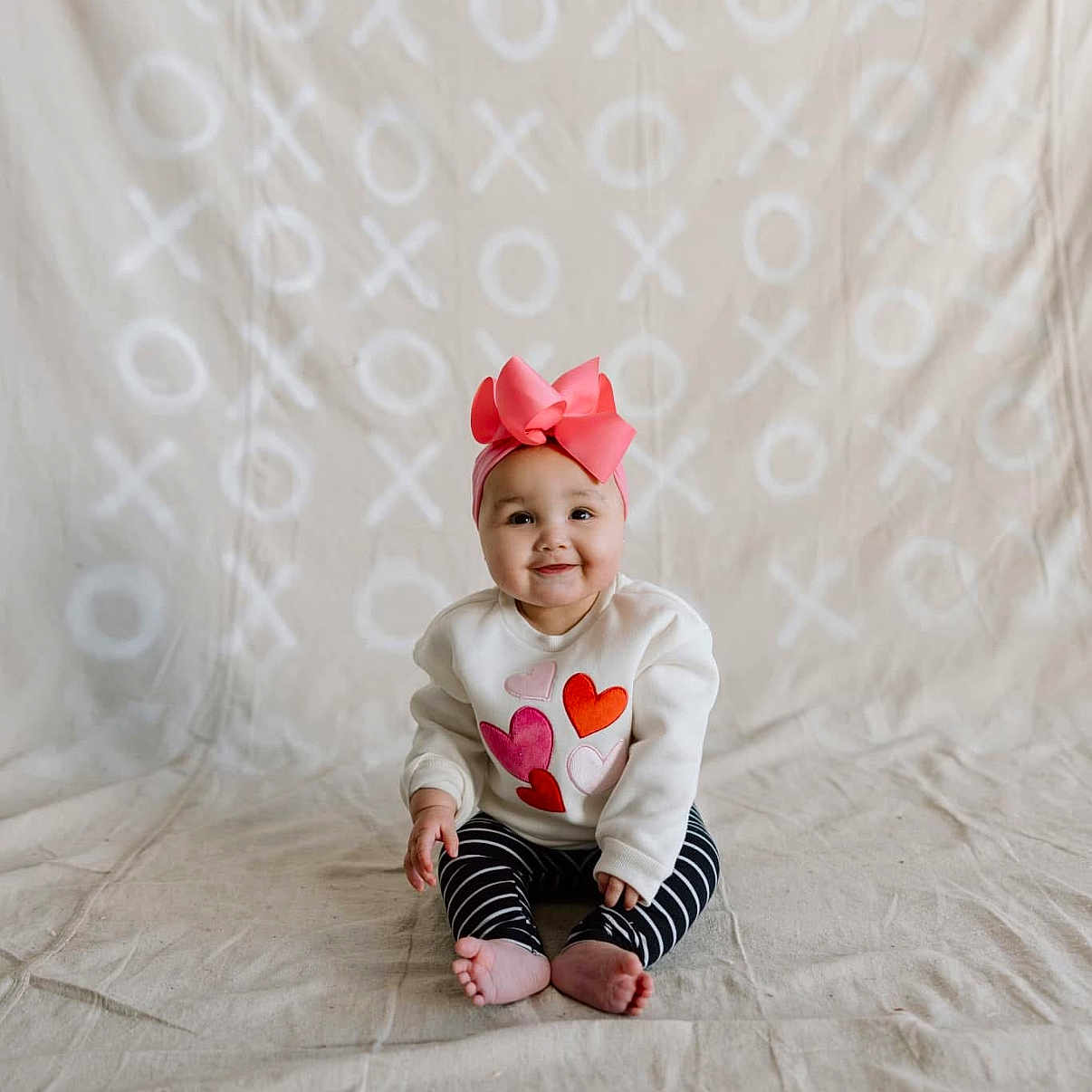 Kaleiya joined the competition — help win amazing prizes! baby, babycrawling, bathingcap, bodypart, cap, clothing, crawling, dress, face, finger, happy, hat, head, pants, person, photography, portrait, sitting, sleeve, smile