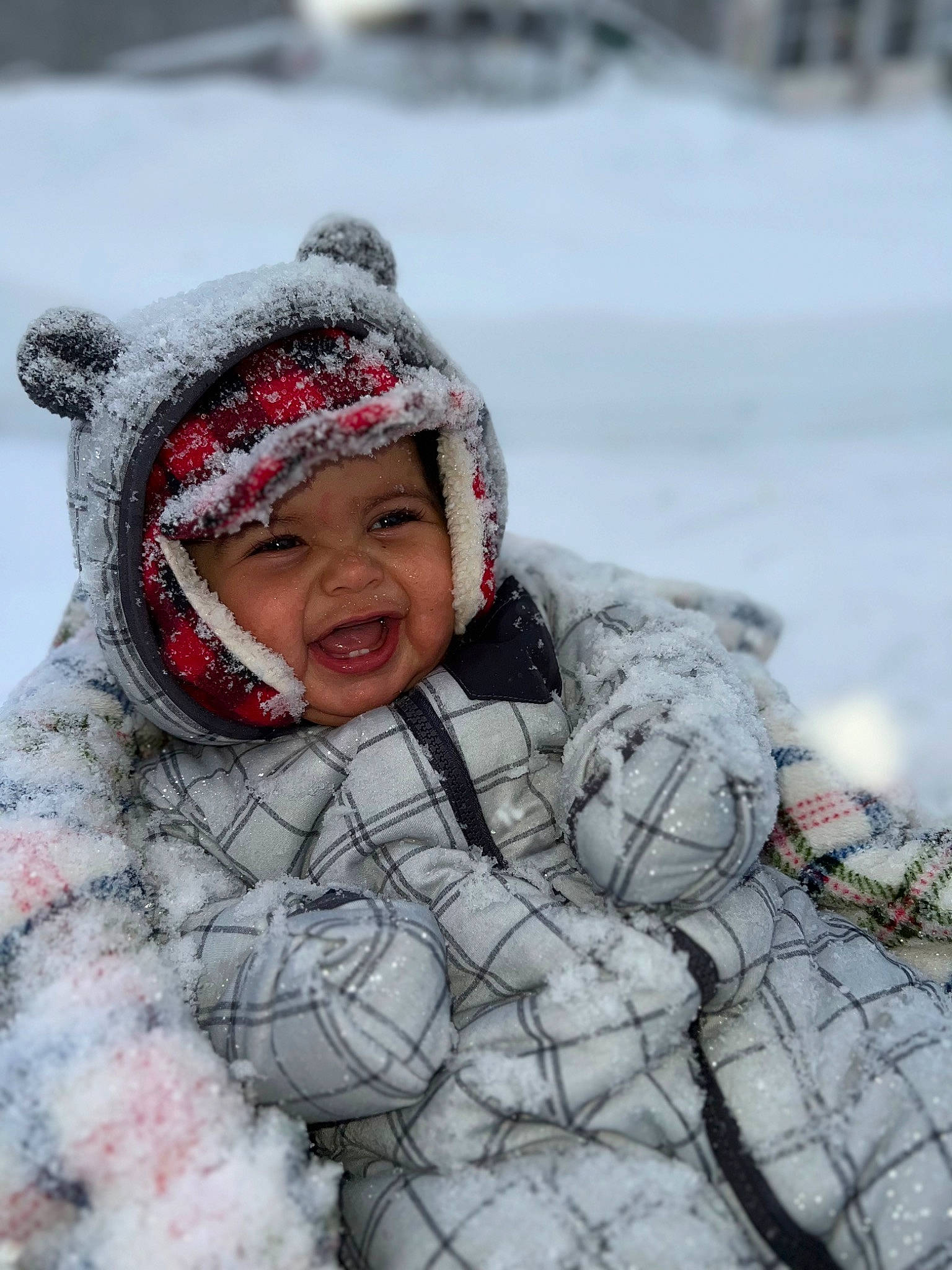 Zakariye is registered to the contest to win money with this photo: child, eye, face, freezing, frost, fun, fur, geological_phenomenon, happy, head, headgear, headwear, ice_cap, knit_cap, person, playing_in_the_snow, precipitation, recreation, smile, snow