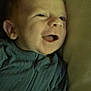 Jesse is registered to the contest to win money with this photo: baby, smiling, infant, blue_clothing, pillow, lying_down, indoors, face, happy, child, cute, young, portrait, apparel, sleepwear, hand, skin, head, expression, cozy