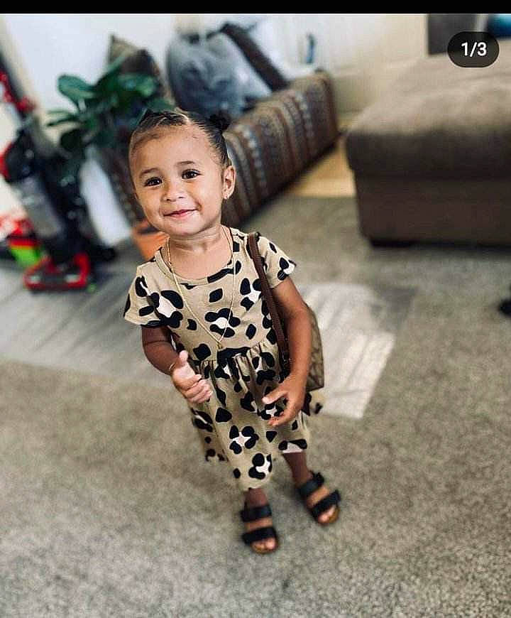 Heaven is registered to the contest to win money with this photo: baby, baby_toddler_clothing, child, cool, day_dress, eye, fashion_design, floor, flooring, foot, happy, human_leg, joy, pattern, person, shoulder, sleeve, smile, thigh, toddler