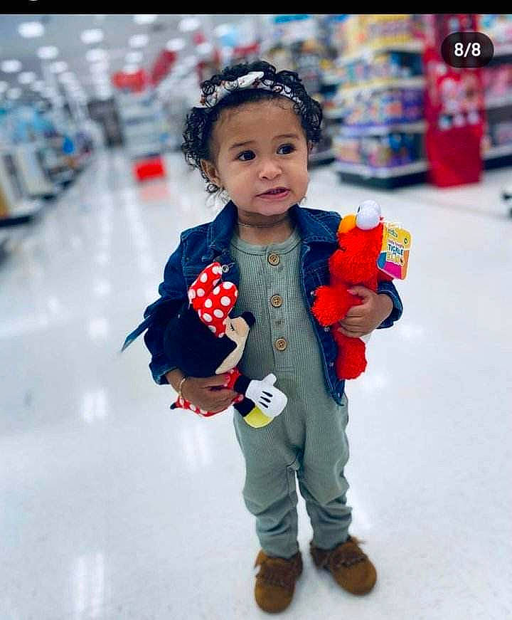 Heaven is registered to the contest to win money with this photo: child, costume, electric_blue, event, fashion_accessory, flower, freezing, fun, happy, hat, leisure, person, plant, recreation, sandal, sleeve, snow, toddler, tradition, wheel