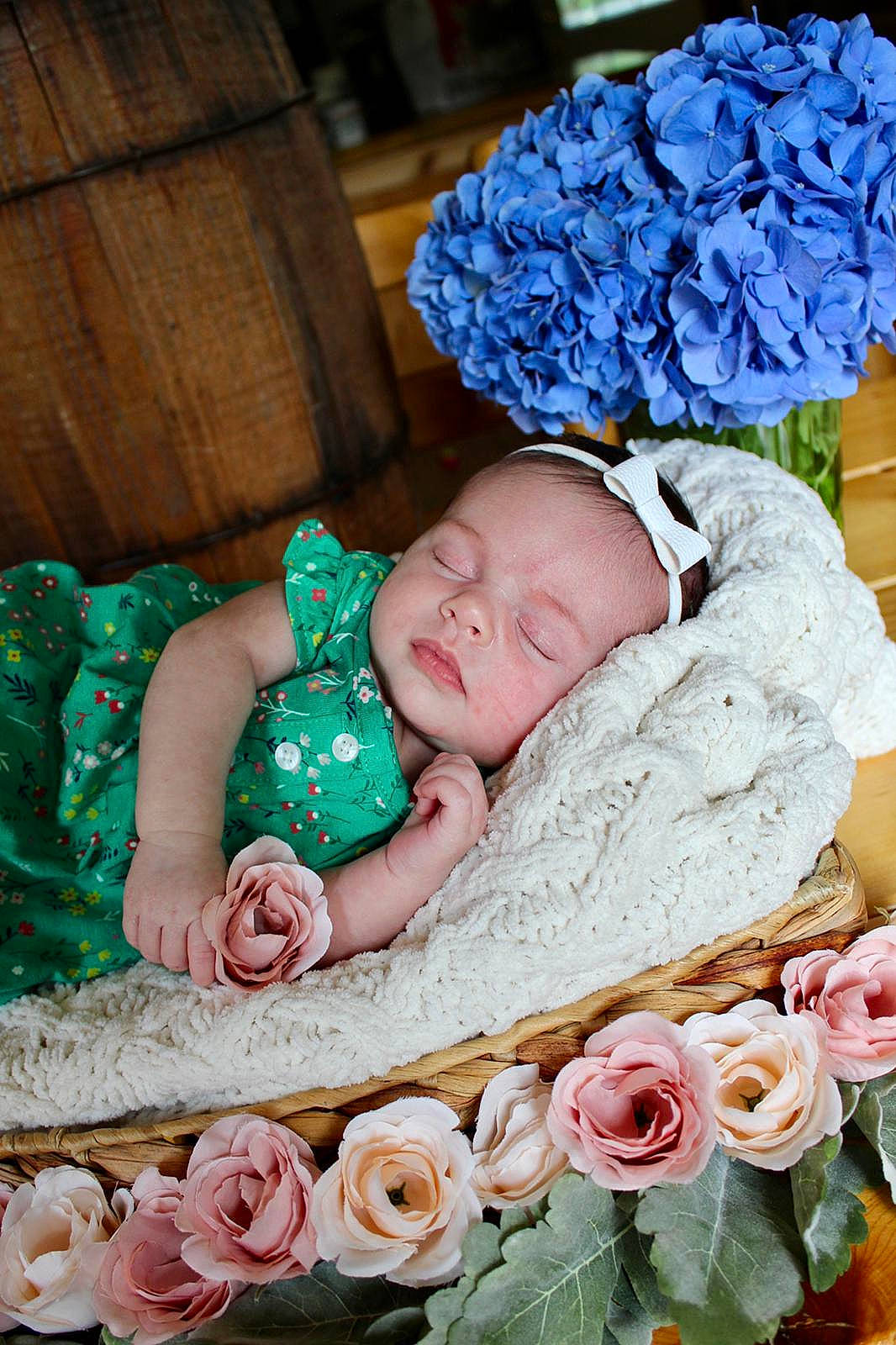 Faith joined the competition — help win amazing prizes! baby, baby_sleeping, baby_toddler_clothing, beauty, blue, child, comfort, flower, happy, headgear, linens, pattern, person, petal, photograph, pink, product, rose, textile, toddler