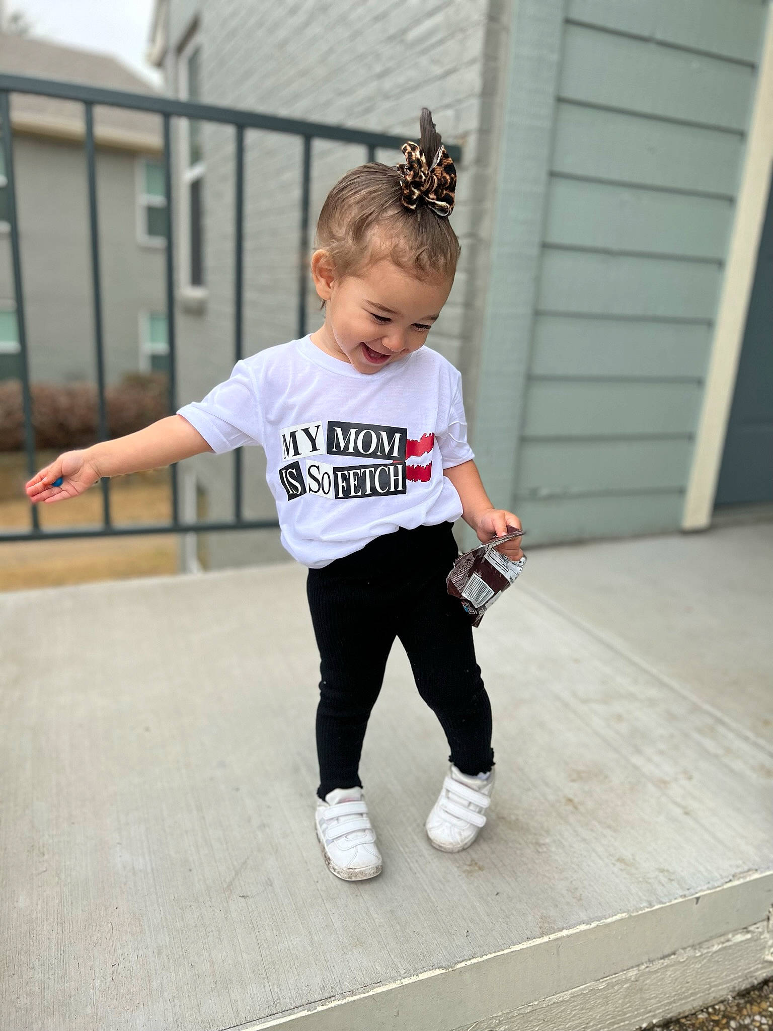 Maisyn is registered to the contest to win money with this photo: active_pants, baby_toddler_clothing, child, eyewear, fashion_design, flooring, grey, hair, happy, head, joy, knee, person, recreation, sleeve, sportswear, street_fashion, sweatpant, t_shirt, thigh