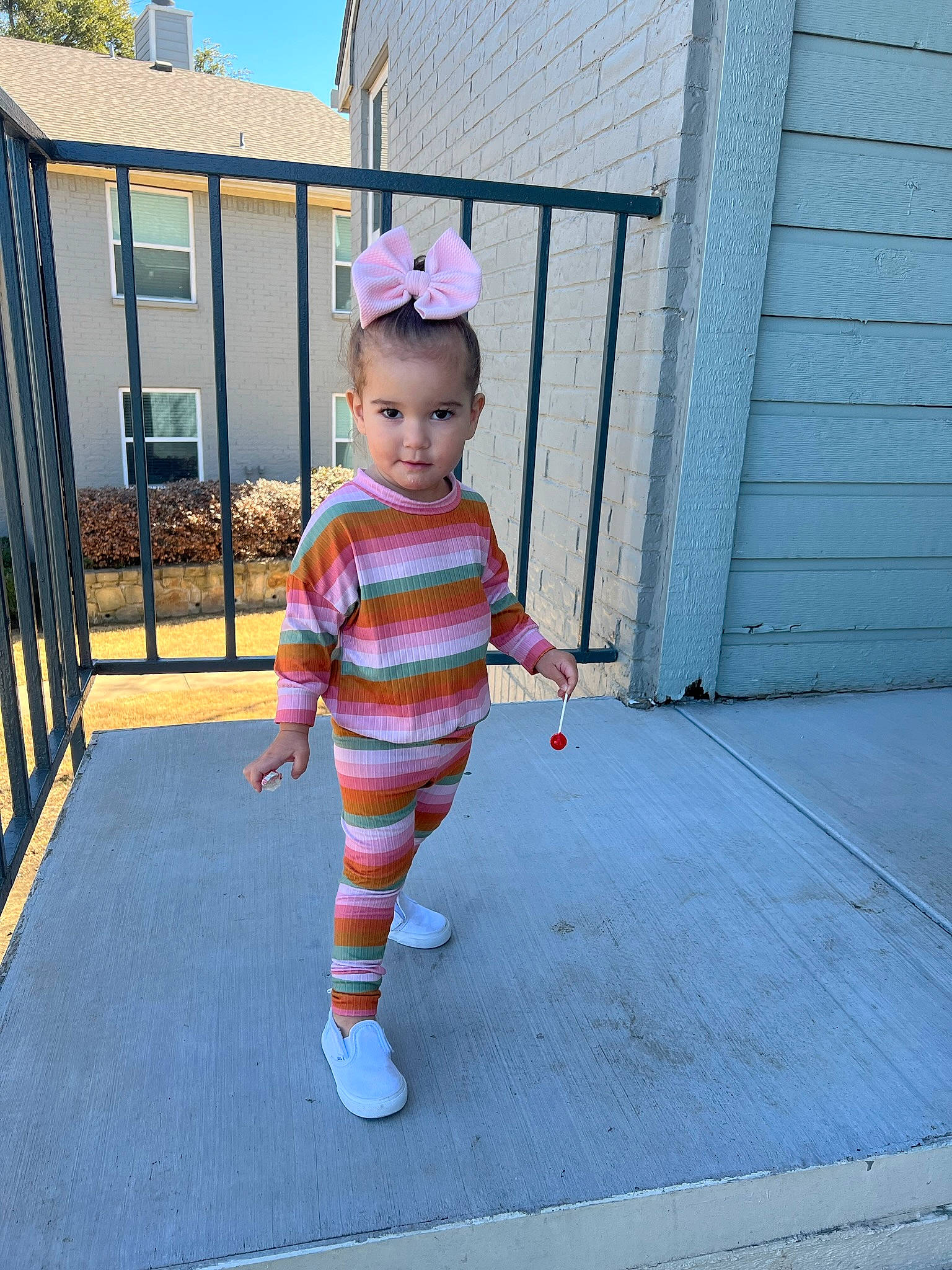 Maisyn joined the competition — help win amazing prizes! asphalt, baby, baby_toddler_clothing, child, electric_blue, flooring, fun, grass, happy, hat, house, leisure, magenta, pattern, person, play, recreation, sky, sleeve, t_shirt