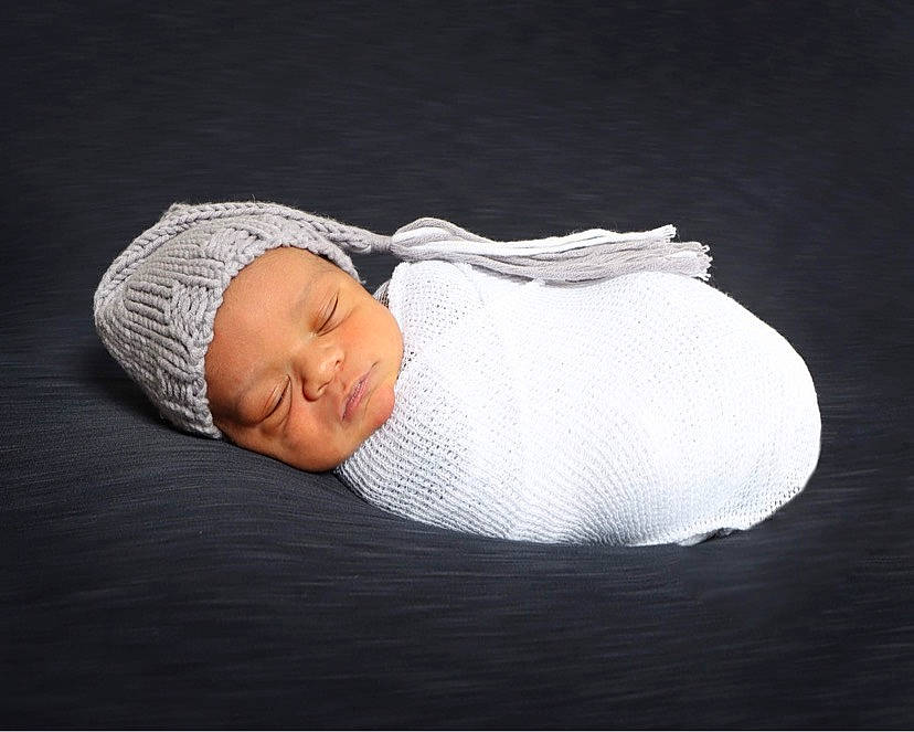 Coby is registered to the contest to win money with this photo: baby, baby_products, baby_sleeping, baby_toddler_clothing, cap, cheek, child, comfort, darkness, hat, headwear, linens, nap, person, portrait_photography, room, sitting, sleep, sleeve, toddler