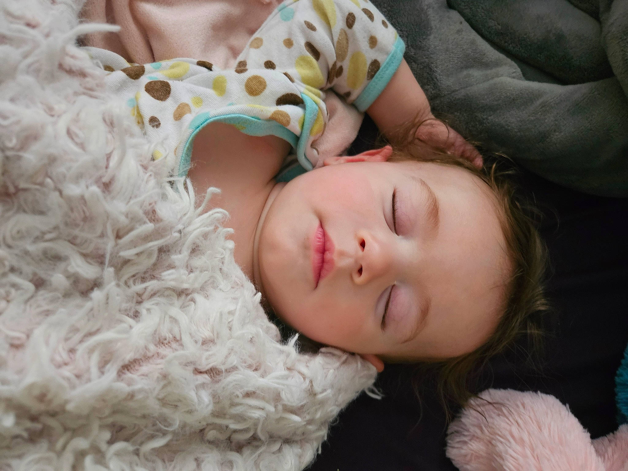 Mason is registered to the contest to win money with this photo: baby, cheek, child, comfort, couch, fur, grass, happy, linens, nap, pattern, person, portrait_photography, sitting, skin, sleep, textile, toddler, tree, vertebrate