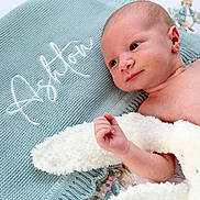 Ashton joined the competition — help win amazing prizes! newborn, baby, blanket, knitted, blue, white, soft, infant, child, nursery, cute, portrait, skin, lying, wrapped, face, eyes, hand, peaceful, indoors