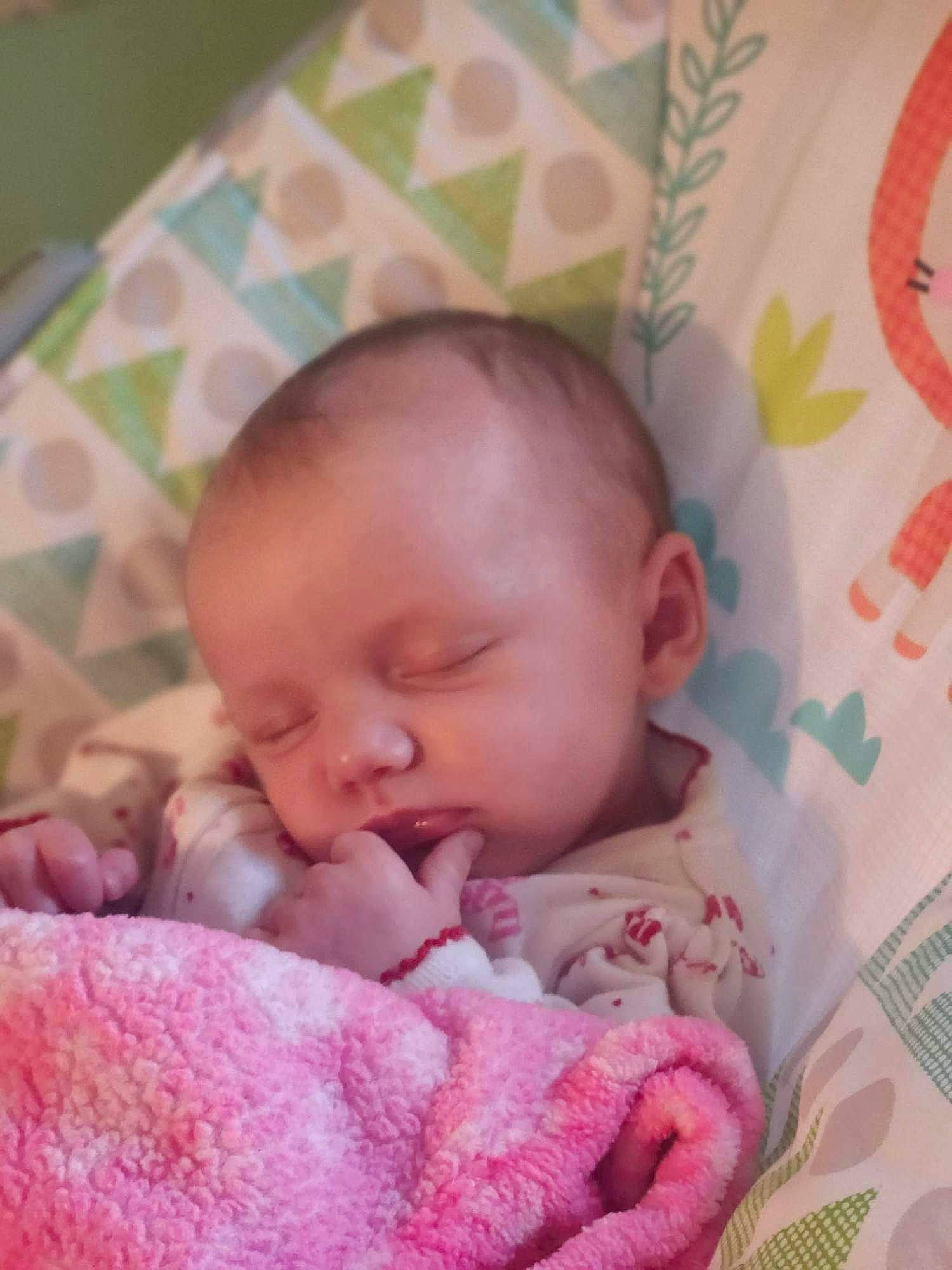 Bailey joined the competition — help win amazing prizes! baby, baby_sleeping, baby_toddler_clothing, bedtime, cheek, child, chin, comfort, eye, happy, head, iris, linens, lip, magenta, nose, pattern, person, pink, skin