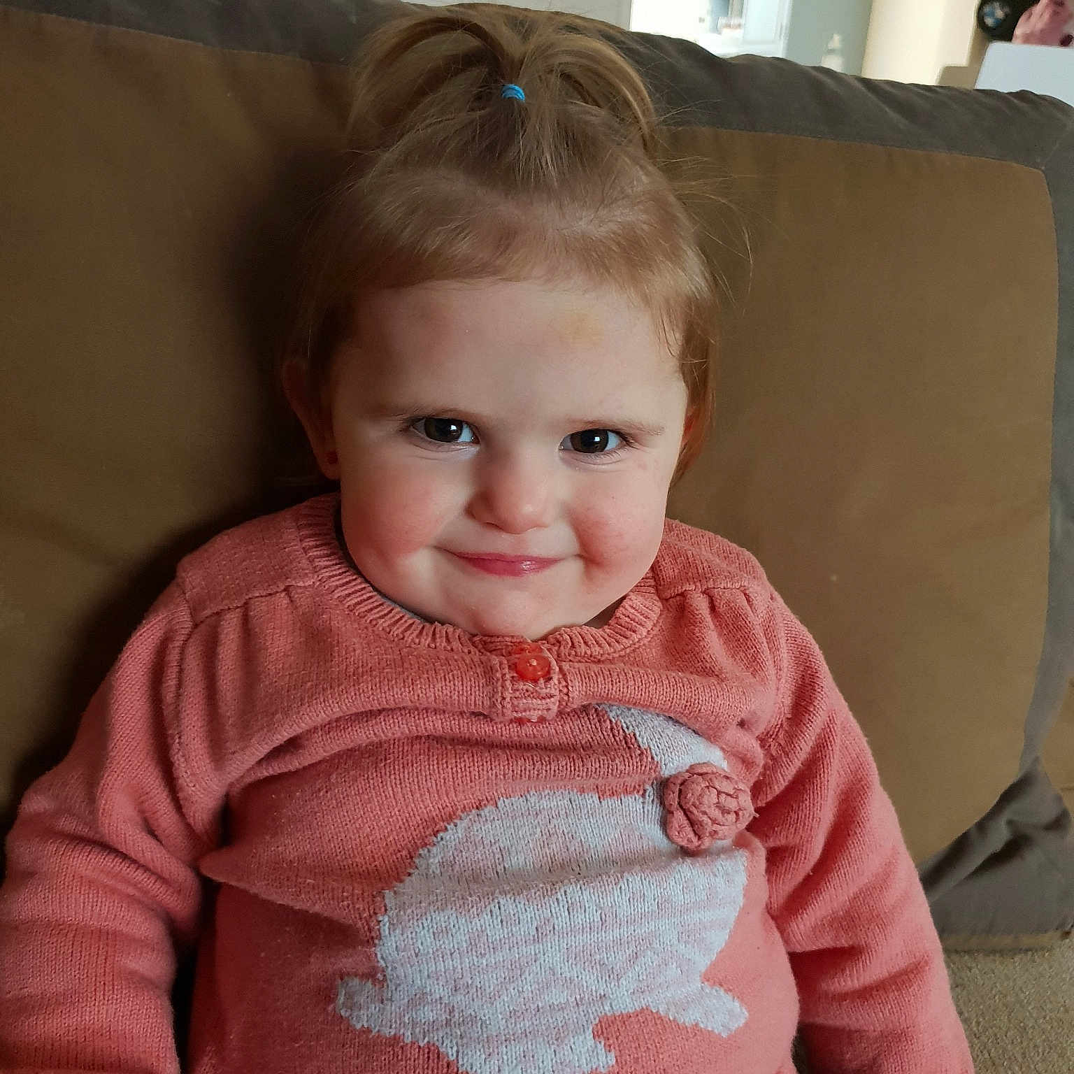 Liliana a rejoint le concours — aidez-le/la à gagner de superbes lots ! cheek, child, day, eye, girl, hair, head, human_hair_color, infant, joy, knitting, nose, organ, outerwear, person, pink, sitting, skin, smile, standing