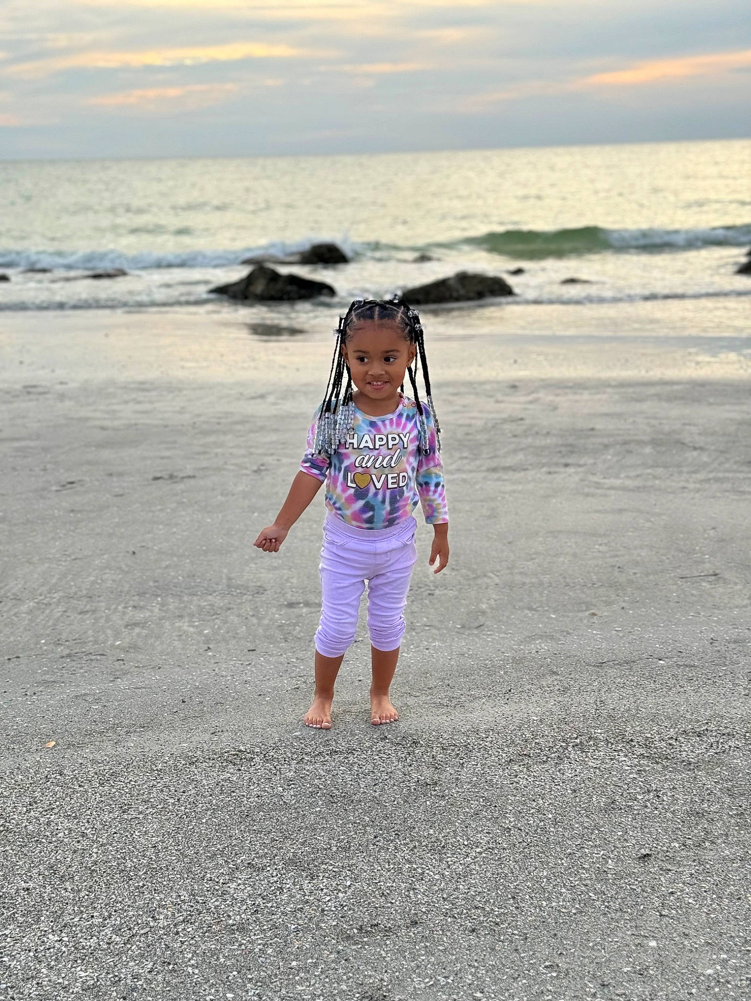 Reign is registered to the contest to win money with this photo: beach, cloud, coastal_and_oceanic_landforms, fun, happy, horizon, joy, landscape, leisure, natural_environment, people_in_nature, person, sand, shore, sky, sleeve, sunlight, t_shirt, toddler, travel