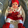 Romy participe au concours pour gagner de l'argent avec cette photo : baby, infant, red_headband, red_booties, white_tights, baby_rocker, smiling, cute, portrait, indoor, child, baby_clothes, headgear, footwear, seat, floor_tiles, happy, closeup, person, baby_fashion