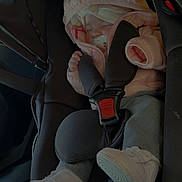 Romy a rejoint le concours — aidez-le/la à gagner de superbes lots ! baby, sleeping, car_seat, pacifier, pink_jacket, hood, sneakers, seatbelt, child, infant, cozy, car_interior, nap, clothing, strapped_in, cute, toddler, safety, resting, small