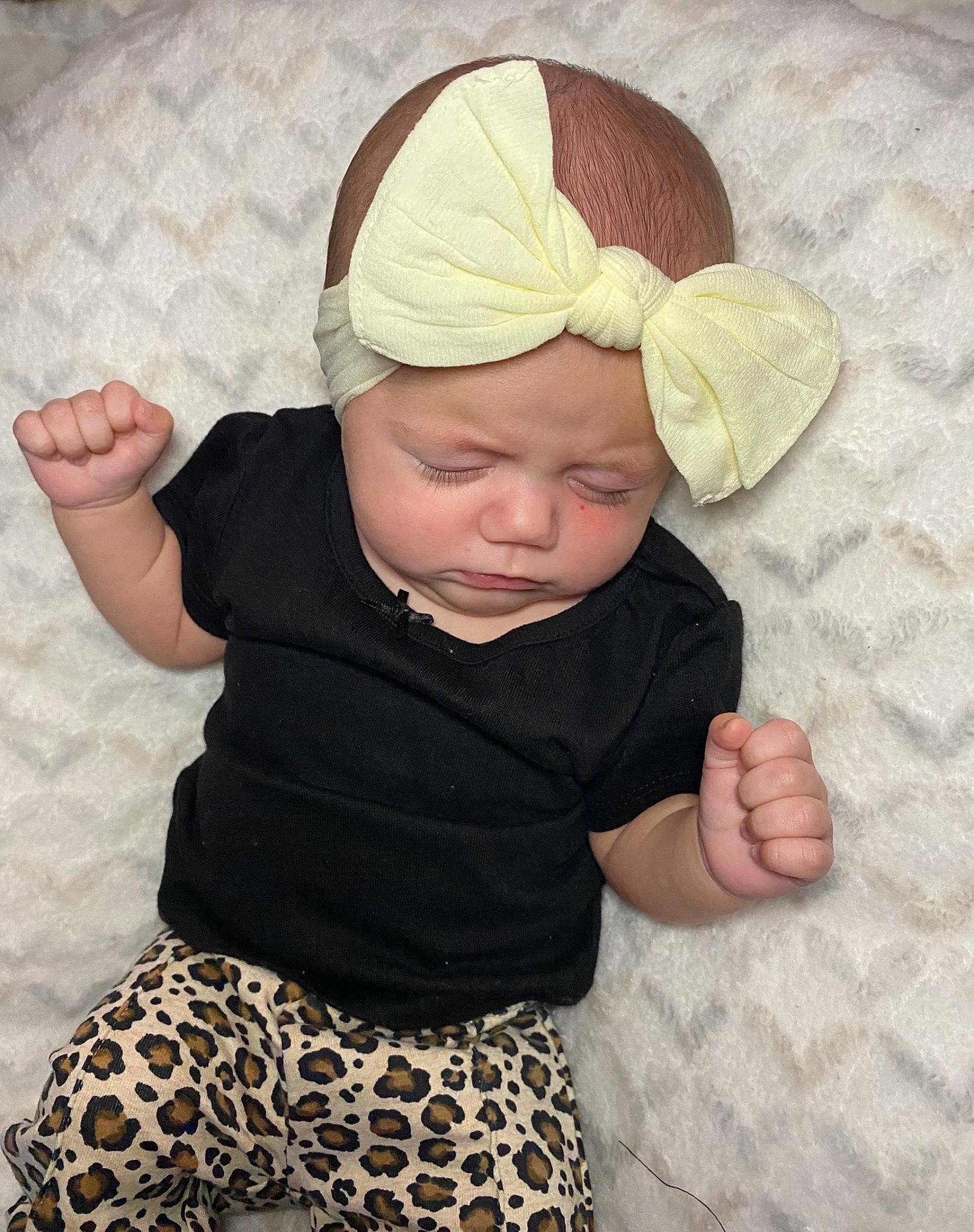 Aspyn is registered to the contest to win money with this photo: baby, baby_toddler_clothing, cap, comfort, eye, face, finger, grass, head, headwear, human_body, linens, outerwear, pattern, person, skin, sleeve, t_shirt, textile, thumb