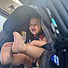 baby, car_interior, car_seat, child, clothing, cute, feet, happy, infant, laughing, person, playful, safety, seat, seatbelt, smiling, sunlight, toddler, vehicle, window