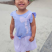 Elena joined the competition — help win amazing prizes! child, girl, purple_dress, sandal, outdoor, sidewalk, heart_doodle, smiling, standing, daylight, casual_clothing, happy, young_child, people_in_background, urban, nature, trees, pavement, summer, cute