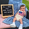 baby, infant, child, blue_blanket, wicker_chair, outdoor, grass, sidewalk, american_flag, clothing, white_shoes, sign, text, holiday, 4th_of_july, cute, portrait, sitting, summer, celebration