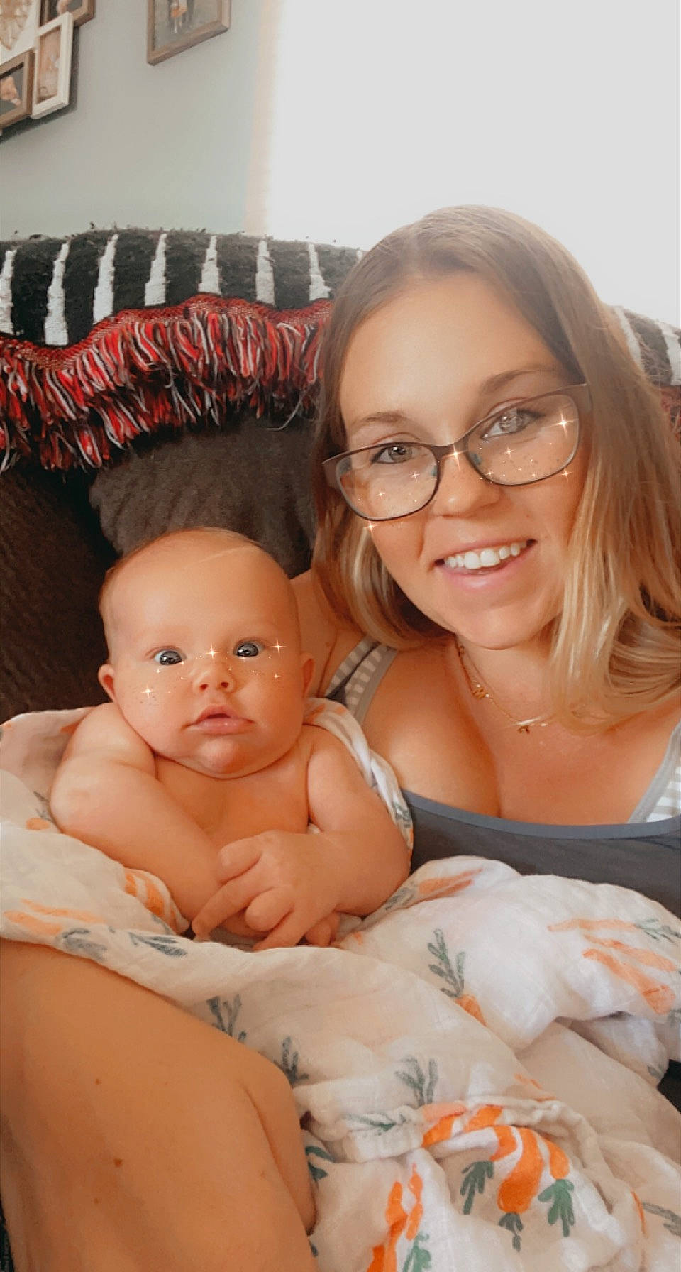 Ethan is registered to the contest to win money with this photo: baby, cheek, comfort, eye, face, facial_expression, finger, fun, glasses, hair, hairstyle, hand, happy, head, iris, joy, mouth, person, skin, smile