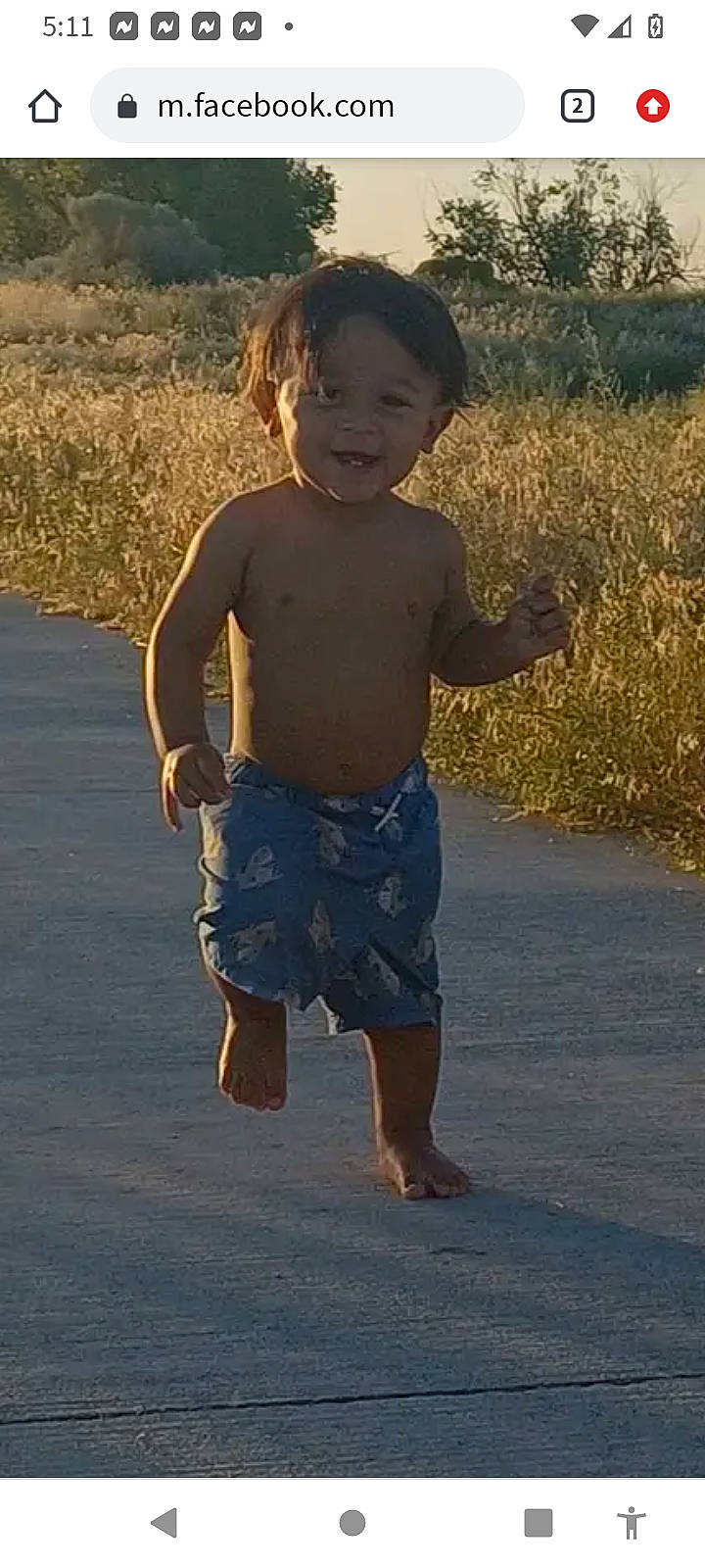 Angelo joined the competition — help win amazing prizes! abdomen, barechested, barefoot, chest, foot, fun, gesture, grass, happy, head, human_leg, people_in_nature, people_on_beach, person, plant, sleeve, smile, toddler, trunk, trunks