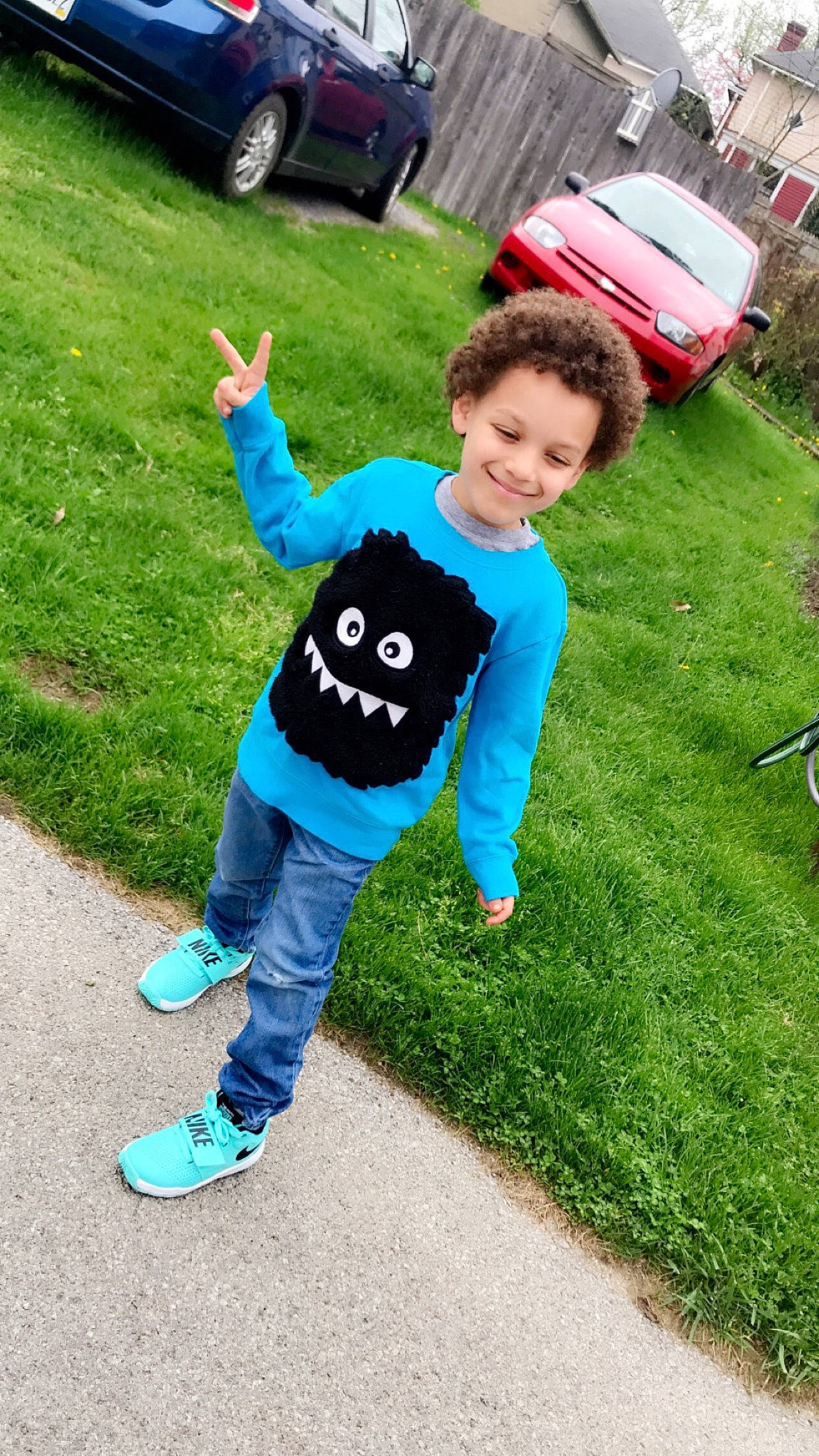 Channing is registered to the contest to win money with this photo: child, cool, fun, grass, joy, lawn, outerwear, person, plant, play, recreation, sleeve, smile, t_shirt, toddler, vacation