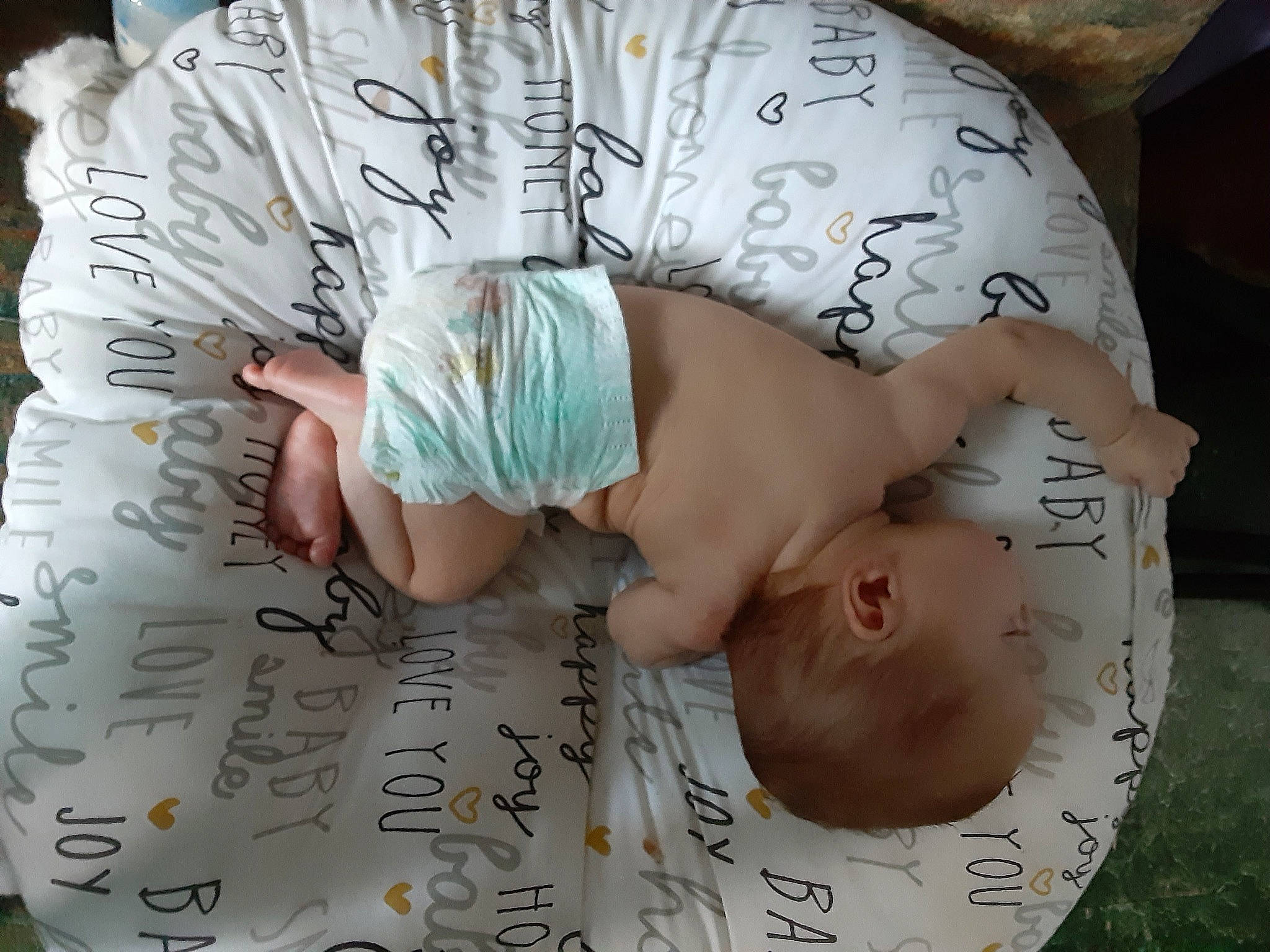 Journee joined the competition — help win amazing prizes! arm, baby, baby_products, baby_toddler_clothing, child, comfort, finger, font, grass, hand, handwriting, happy, human_body, linens, organ, pattern, person, sitting, sleeve, toddler