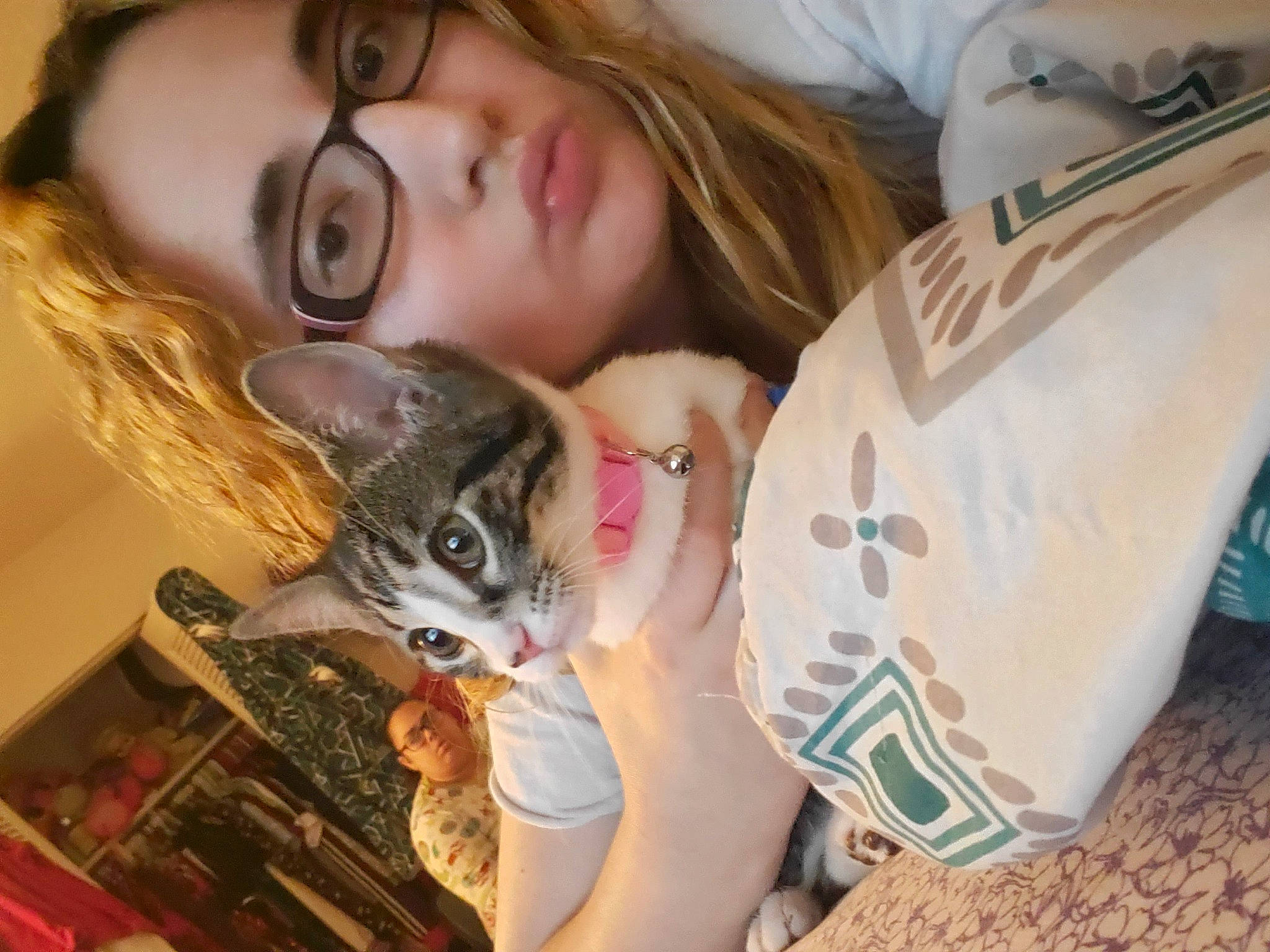 Cookie is registered to the contest to win money with this photo: carnivore, cat, child, comfort, companion_dog, ear, eyelash, eyewear, fawn, felidae, fun, fur, glasses, happy, long_hair, small_to_medium_sized_cats, textile, tree, vision_care, whiskers