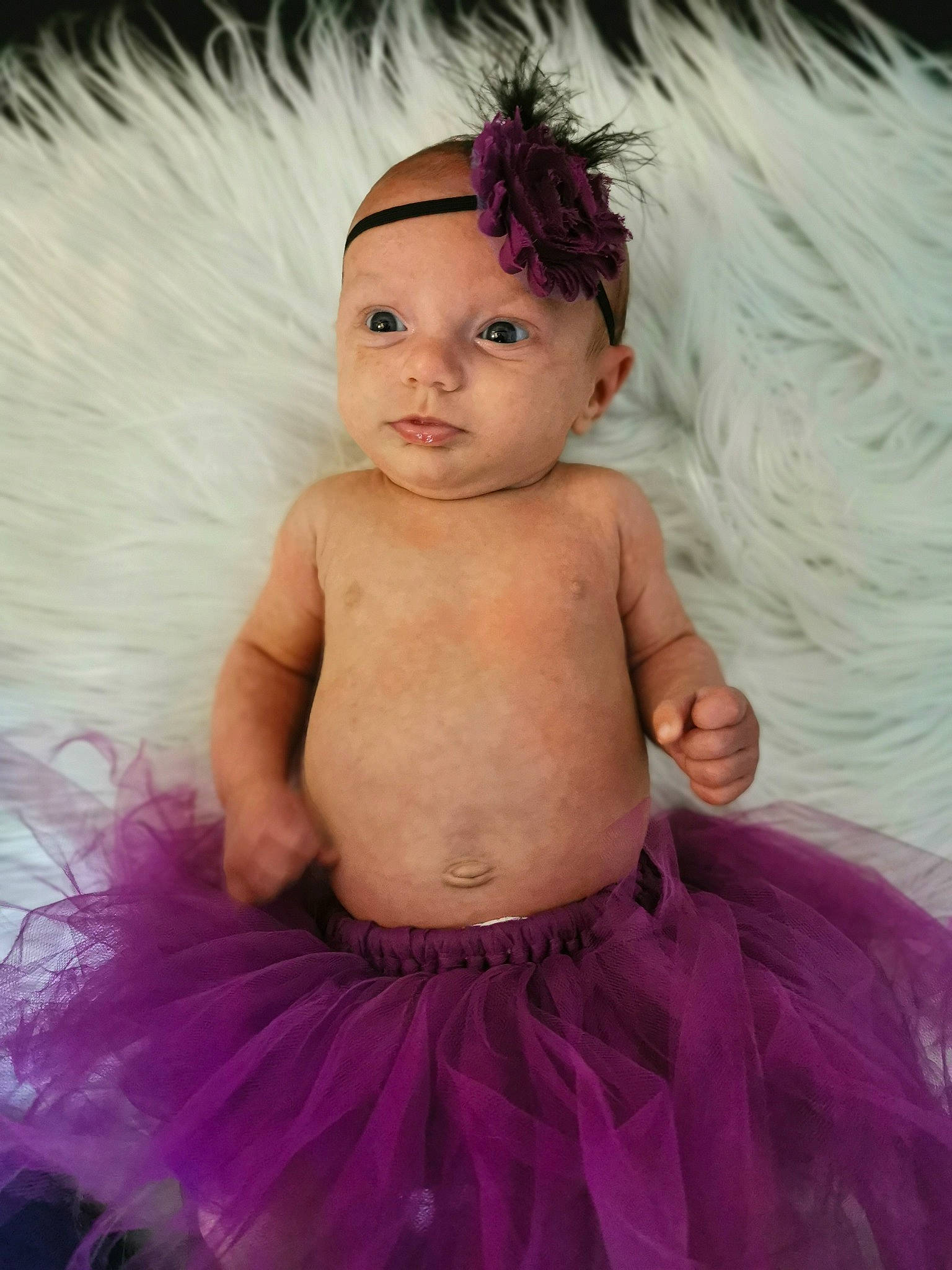 Amara participe au concours pour gagner de l'argent avec cette photo : baby, baby_products, baby_toddler_clothing, ballet_tutu, cheek, child, costume, costume_accessory, face, hair_accessory, head, headpiece, lilac, person, photography, pink, product, purple, skin, toddler