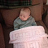 Alice joined the competition — help win amazing prizes! baby, sleeping, blanket, crochet, couch, brown, plaid, fabric, cozy, child, indoor, peaceful, soft, comfort, portrait, young, person, clothing, resting, head