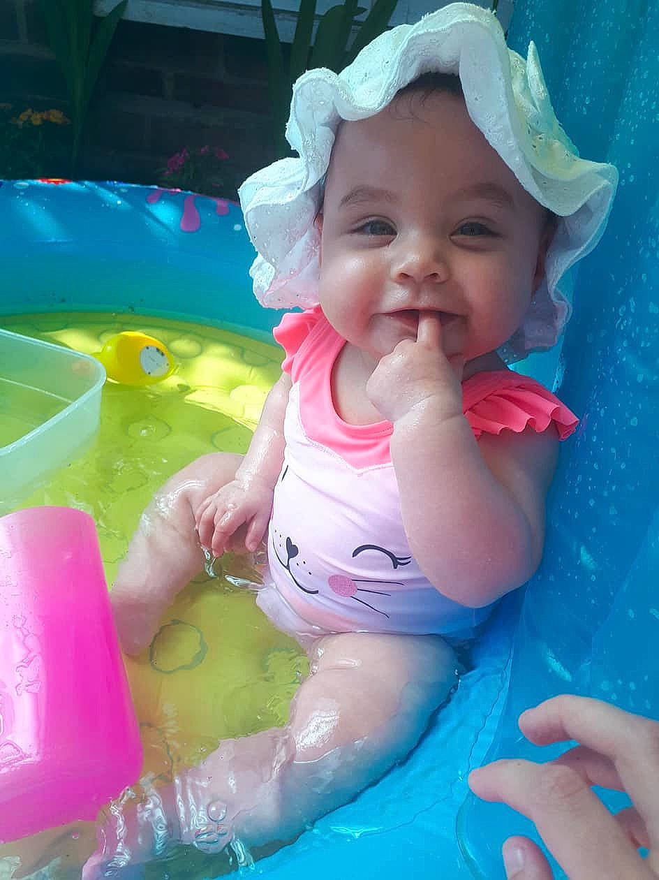 Emily joined the competition — help win amazing prizes! baby_float, baby_products, bathing, cheek, child, fun, girl, happiness, infant, leisure, mouth, person, pink, play, product, skin, smile, summer, toddler, toy