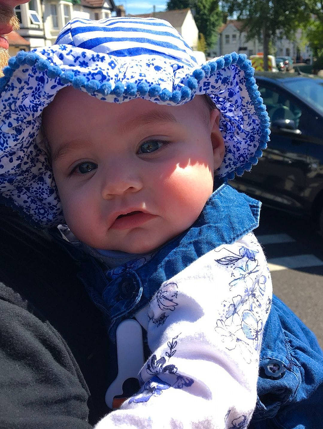 Emily joined the competition — help win amazing prizes! blue, child, cool, eye, fun, girl, head, headgear, headwear, human, infant, person, product, smile, toddler, winter