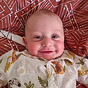 Peregrine is registered to the contest to win money with this photo: baby, babylaughing, clothing, cushion, dress, face, furniture, happy, head, homedecor, laughing, linen, newborn, pattern, person, photography, portrait, quilt, smile, t_shirt