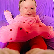 Syris joined the competition — help win amazing prizes! baby, babylaughing, bodypart, clothing, couch, cushion, face, finger, furniture, hand, happy, head, homedecor, laughing, pants, person, photography, portrait, purple, smile