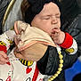 Syris is registered to the contest to win money with this photo: accessories, adult, baby, bodypart, clothing, coat, face, female, finger, hand, hat, head, jacket, jewelry, necklace, newborn, person, photography, portrait, woman