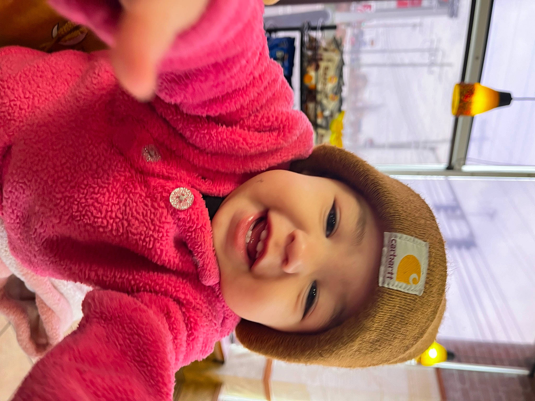 Avah is registered to the contest to win money with this photo: baby, beauty, cap, child, facial_expression, fun, happy, hat, headgear, headwear, knit_cap, leisure, lip, mouth, nose, outerwear, person, skin, smile, toddler