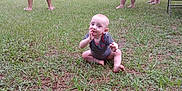 Braxtan is registered to the contest to win money with this photo: baby, grass, outdoor, people, inflatable_slide, child, adult, backyard, casual, summer, family, play, fun, relaxation, nature, event, group, barefoot, clothing, vacation