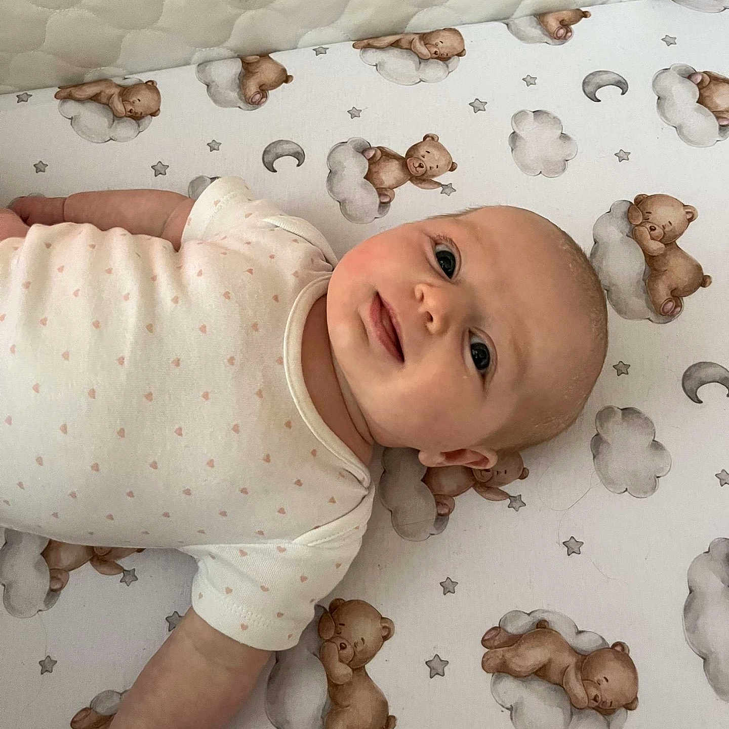 Eliyana is registered to the contest to win money with this photo: baby, crib, face, furniture, head, infantbed, person