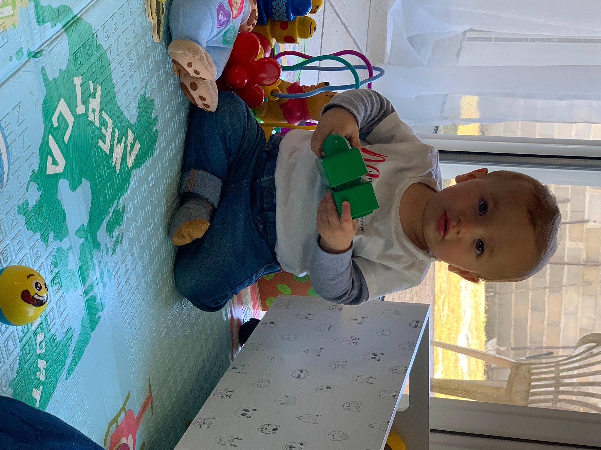 Maël participe au concours pour gagner de l'argent avec cette photo : art, baby, baby_products, baby_toddler_clothing, bouldering, child, climbing, fun, green, leisure, person, play, product, room, sport_climbing, t_shirt, toddler, toy, visual_arts, world