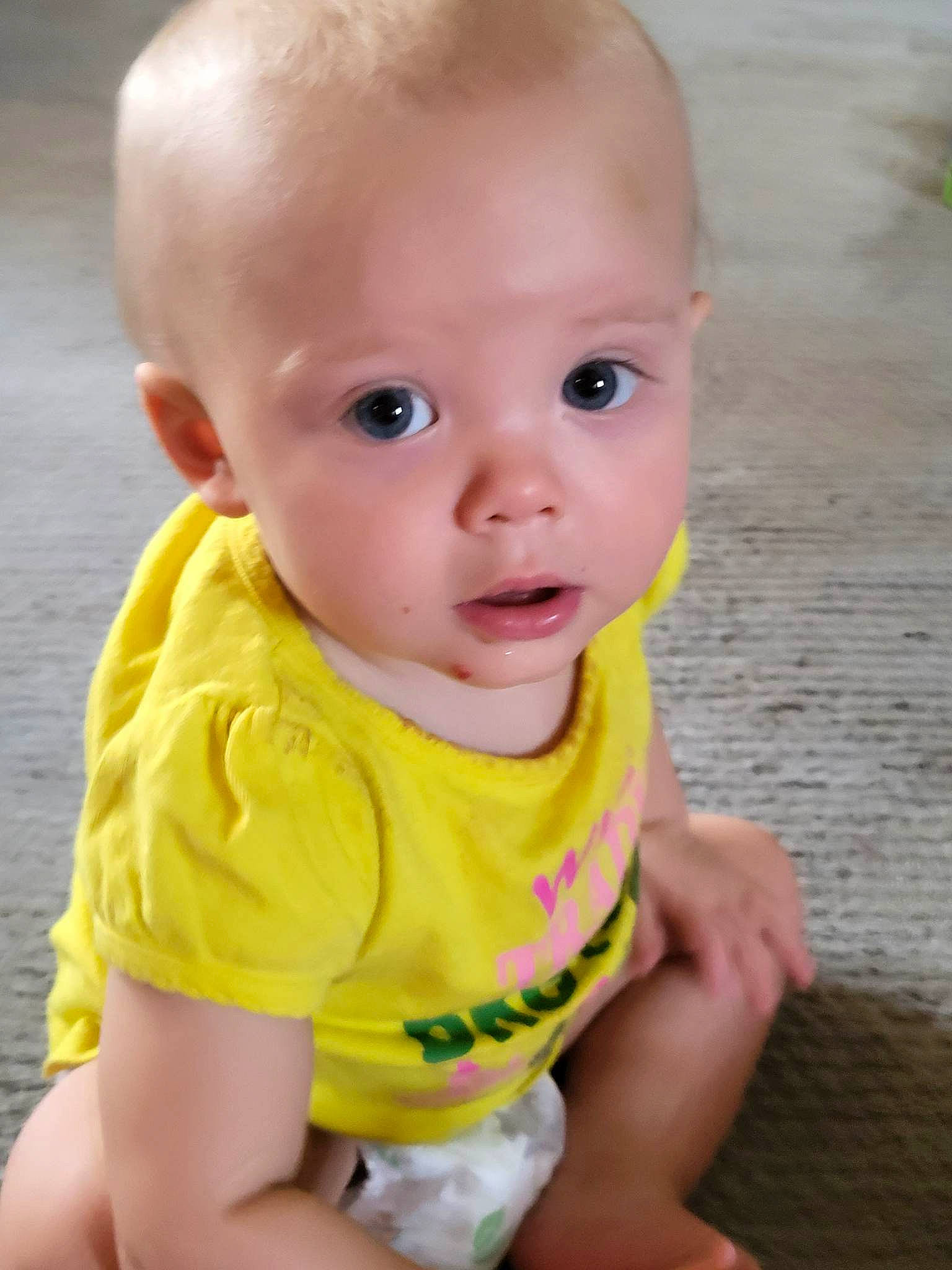 Alivia joined the competition — help win amazing prizes! baby, baby_toddler_clothing, cheek, child, fun, grass, happy, iris, lip, nose, pattern, person, portrait_photography, sitting, skin, sleeve, toddler, vacation, wood